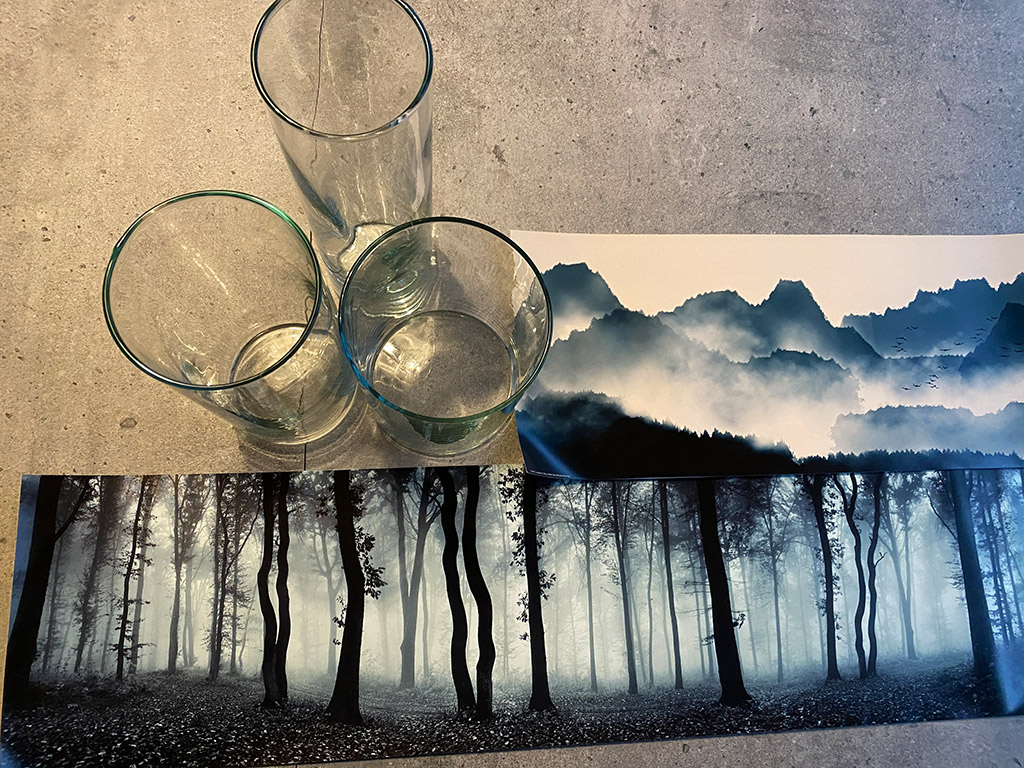 Hjemmelavede lysestager og vaser med kunstneriske motiver